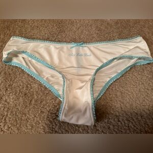 White and blue Victoria’s Secret “Sexy Little Bride” panties, size M.